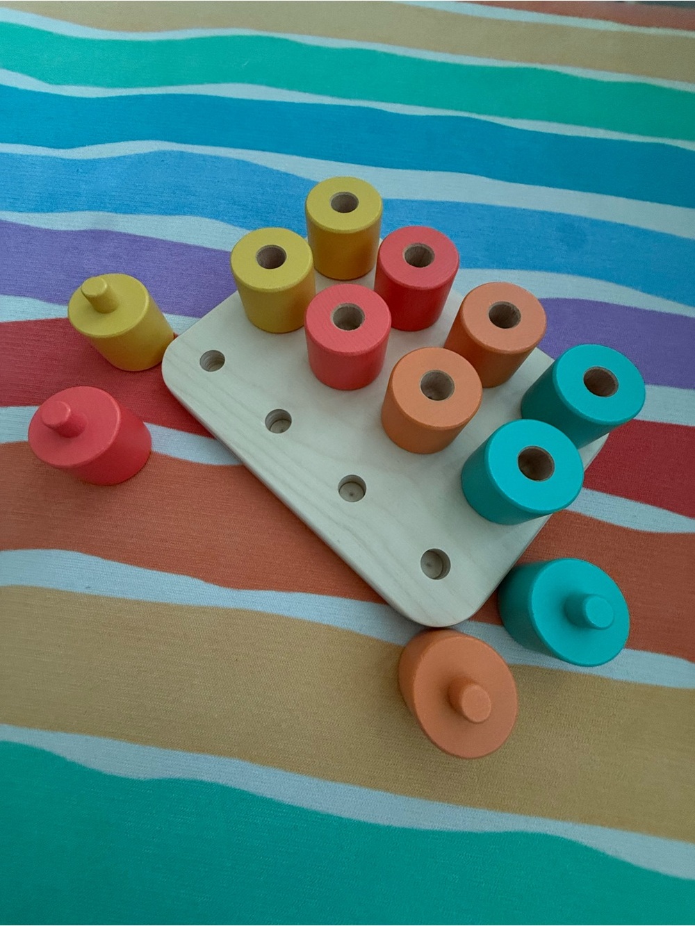 Lovevery Wooden Colorful Peg Board Toy - Rainbow Stackable Cylinders - Picture 2 of 3